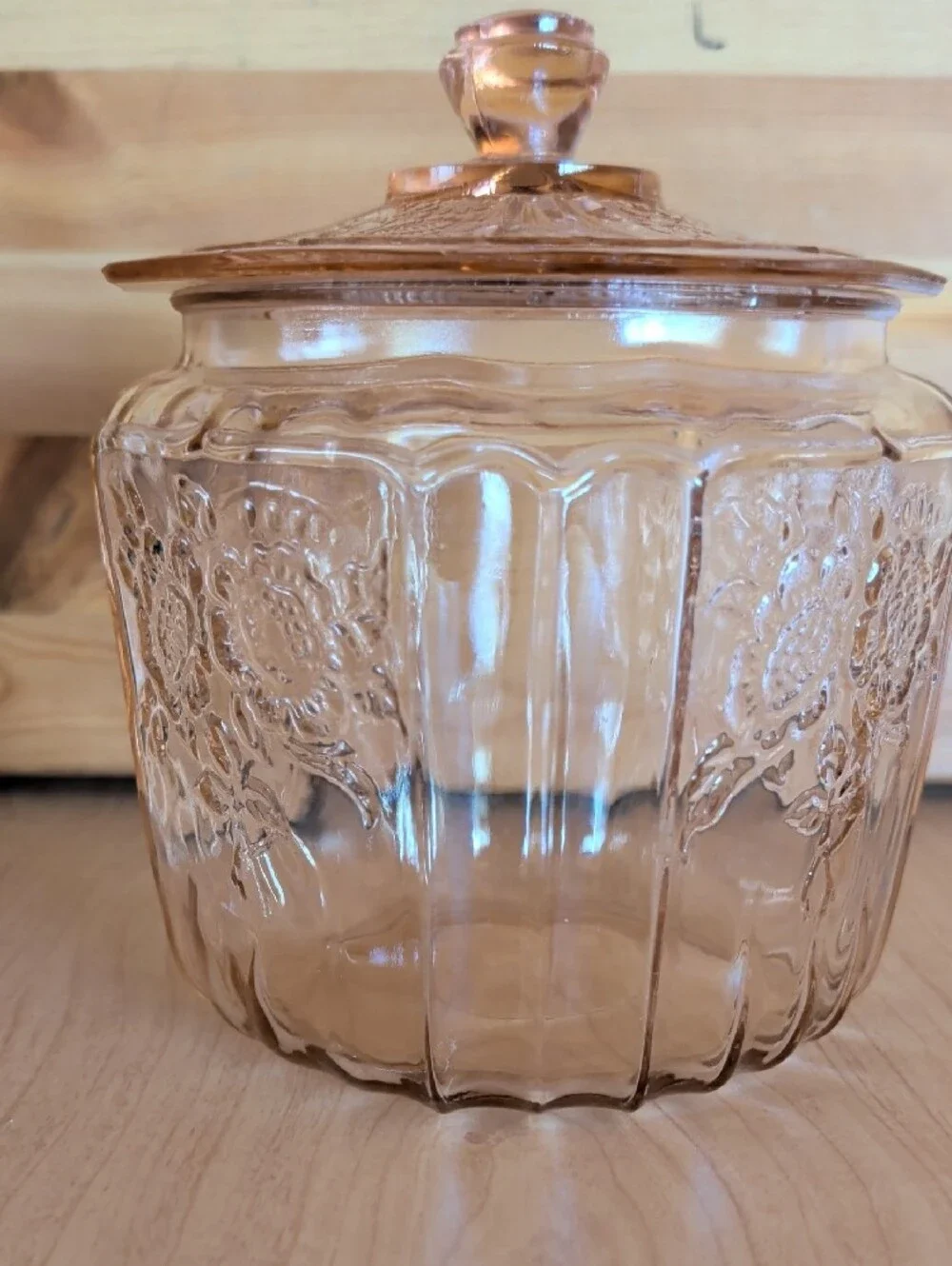 VTG. Pink Pressed Glass Cookie Jar with Lid and Floral Motif.